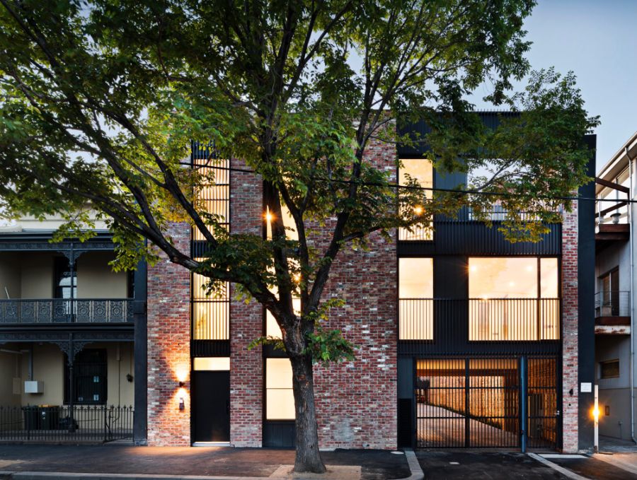 Brick townhouse facade at dusk in North Melbourne